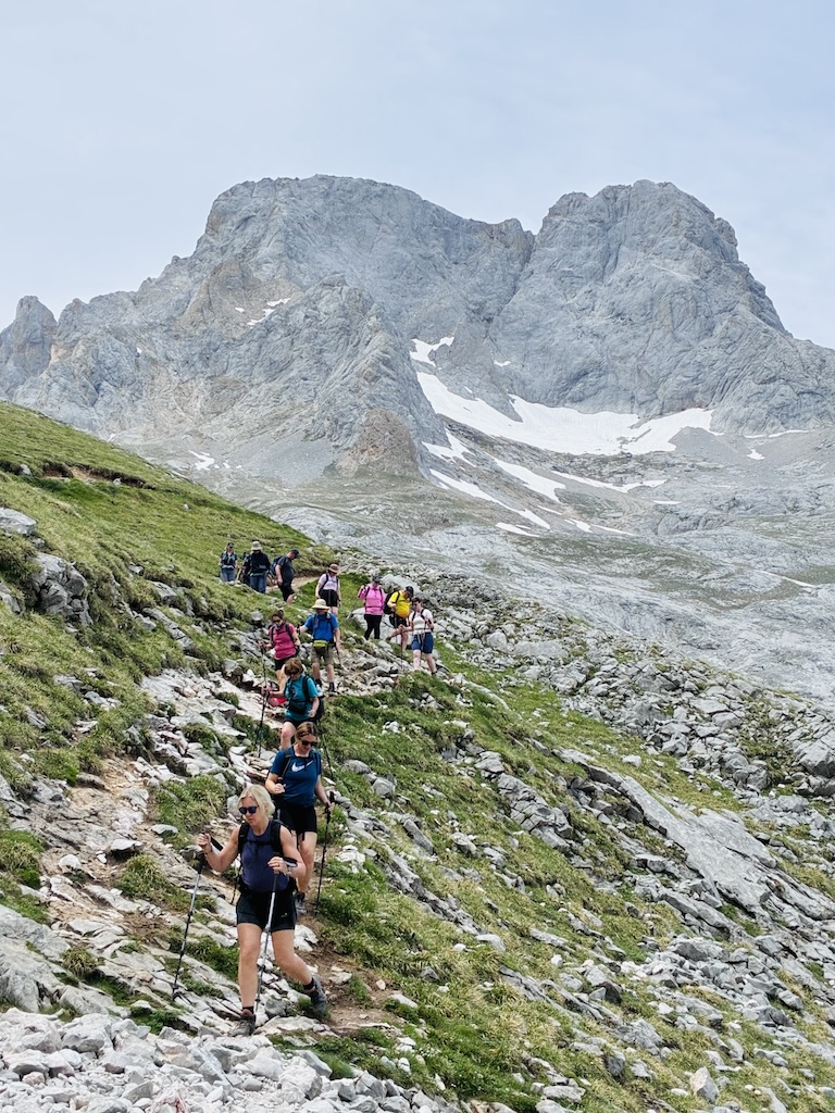 Group of hikers hiking in picos de europa mountain